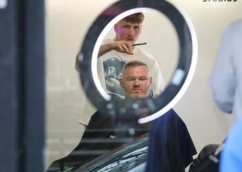 Wayne Rooney and lookalike son Kai headed to the barbers in Cheshire on Friday ahead of wife Coleen's lavish 40th birthday bash.