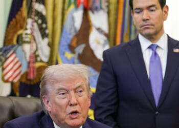 President Donald Trump speaks as Secretary of State Marco Rubio looks on during a meeting in the Oval Office of the White House on April 23, 2026, in Washington, D.C.