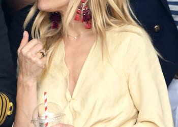 Sienna Miller is fond of her Panthere watch from Cartier. Pictured wearing it at Wimbledon in 2017