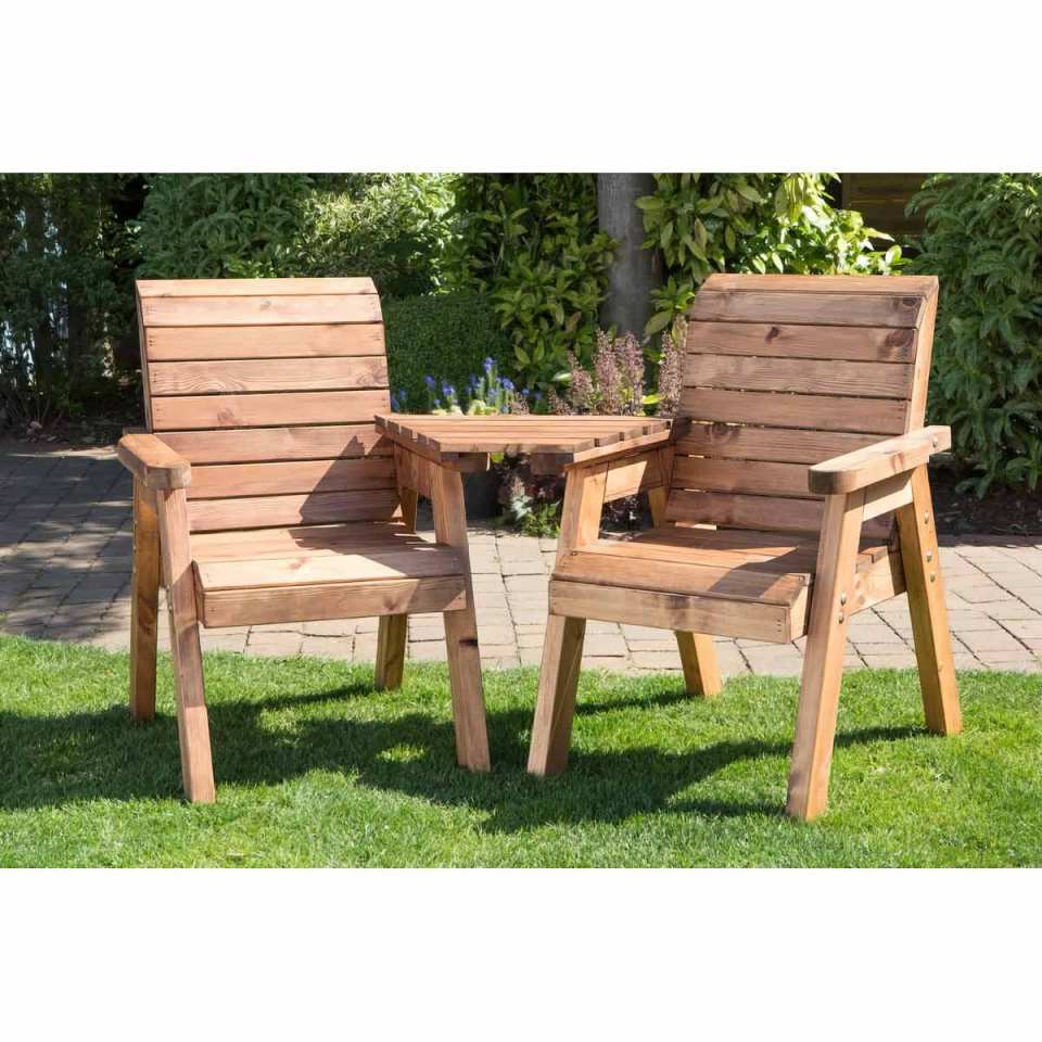 Charles Taylor Angled Twin Companion Set in a garden.