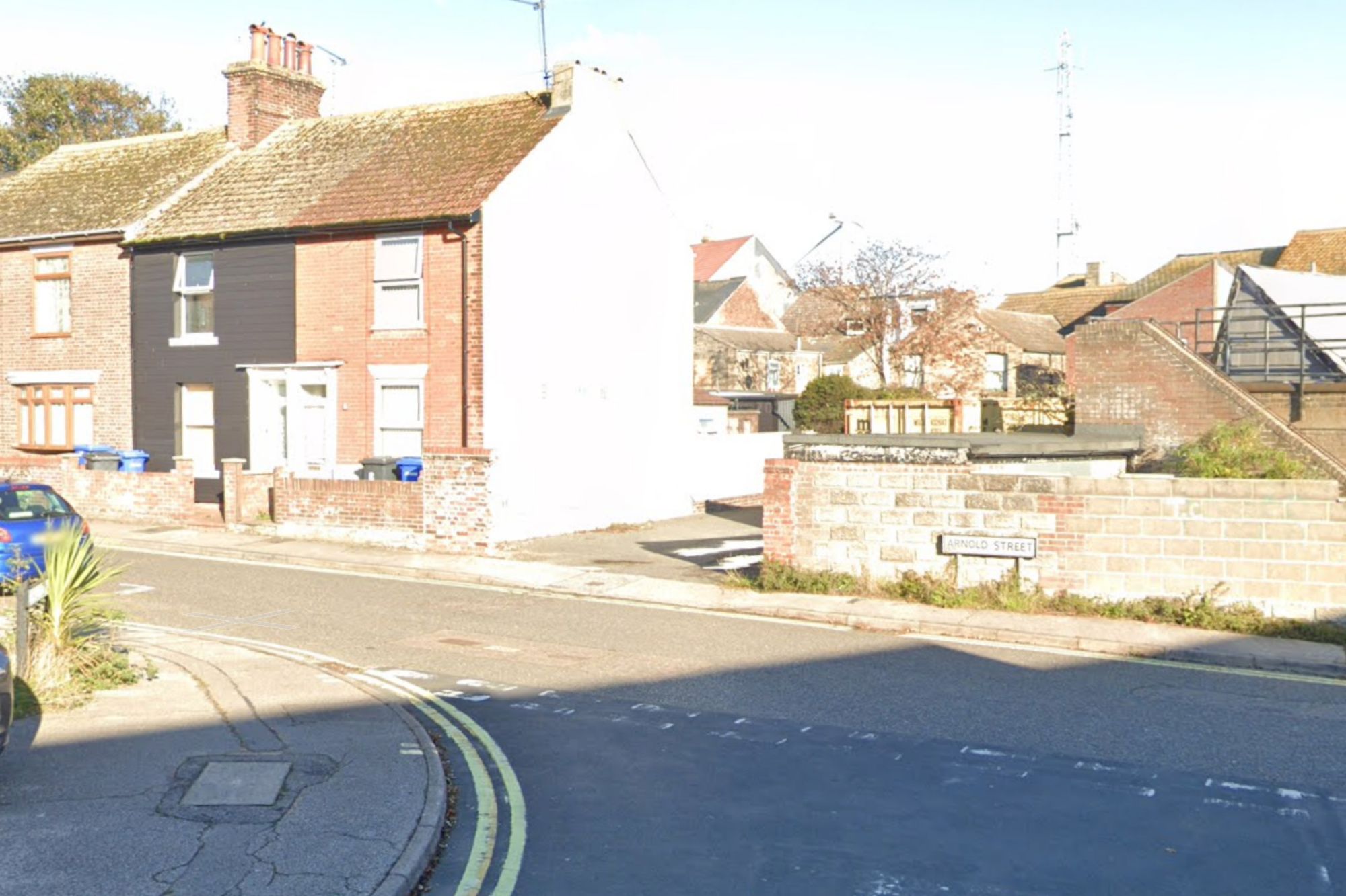 An image collage containing 1 images, Image 1 shows The intersection of Arnold Street and an alleyway in Lowestoft