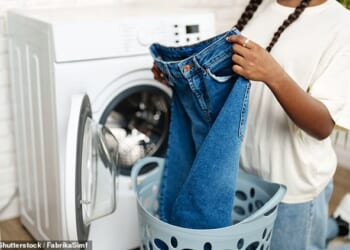Experts from AO.com have revealed exactly how often common items need to be cleaned – including jeans (stock image)