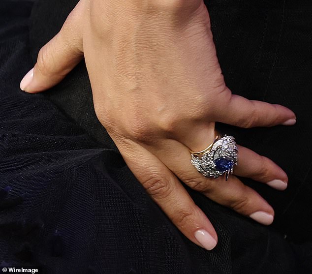 The Dune star also wore a gold band on her left ring finger, next to a chunky statement ring, amid ongoing rumors that she has secretly married Tom Holland, 29