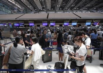 Passengers for international flights at Bangkok Suvarnabhumi Airport in Thailandon Monday