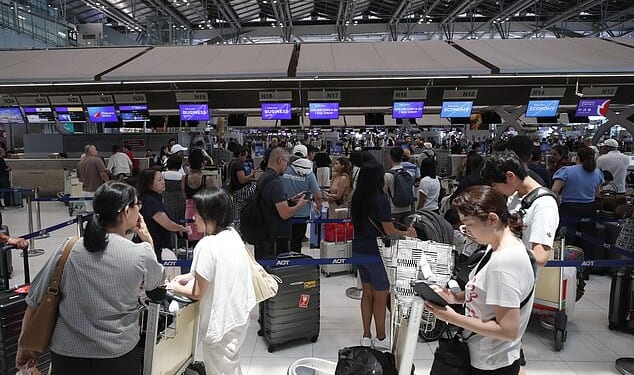 Passengers for international flights at Bangkok Suvarnabhumi Airport in Thailandon Monday