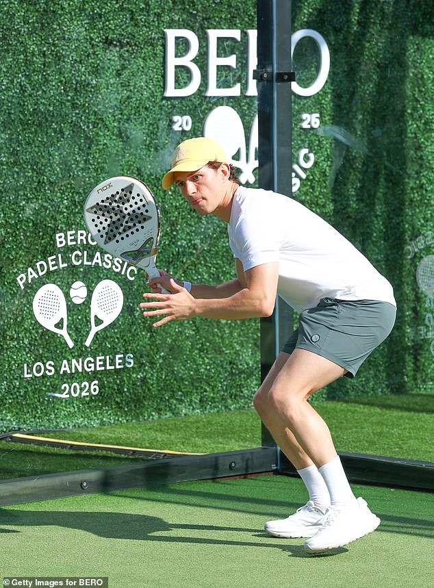 Meanwhile Holland sported a white and green BERO Padel merch t-shirt as he joined in on the on-court action