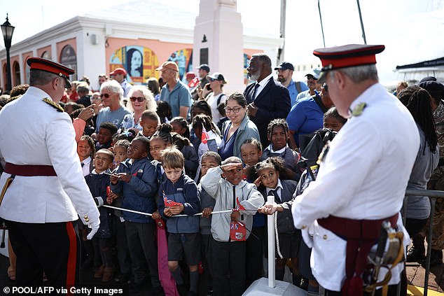 Members of the Royal Bermuda Regiment interact with members of the public in St George's