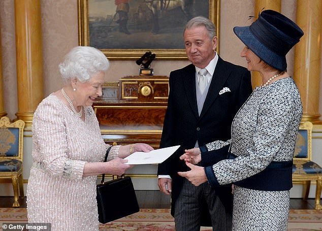 Rod-Larsen and Juul - above, with the late Queen Elizabeth II in 2014 - are known for their roles in the Oslo Accords, the Israeli-Palestinian peace efforts in the 1990s