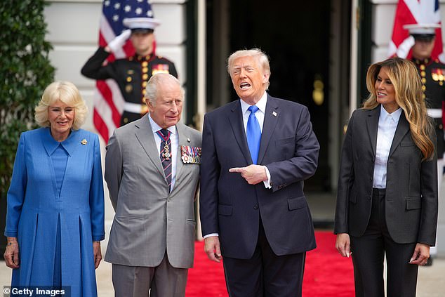 President Donald Trump (center right) points at King Charles and Queen Camilla (left) at an official departure ceremony at the White House Thursday morning, alongside First Lady Melania Trump (right)