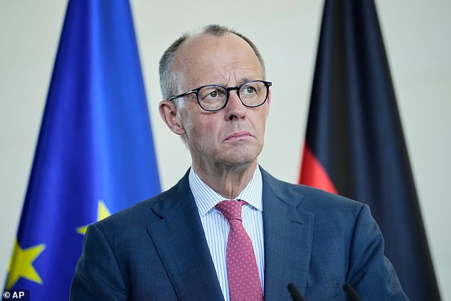 Trump had threatened a drawdown in forces earlier this week after sparring with German Chancellor Friedrich Merz (pictured)
