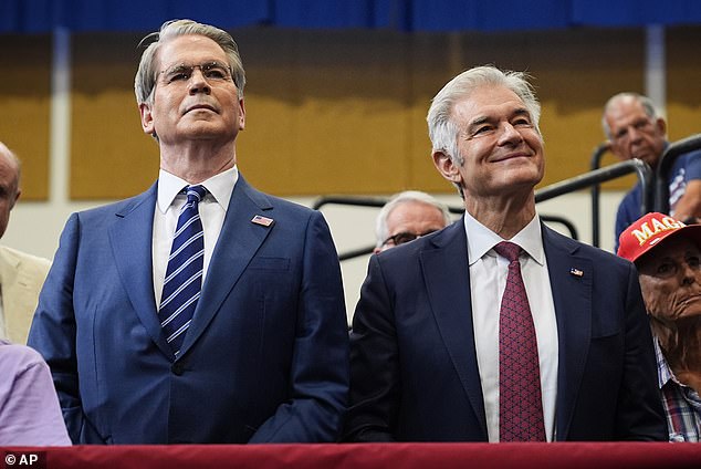 Treasury Secretary Scott Bessent (left) and Centers for Medicare & Medicaid Services administrator Dr. Mehmet Oz (right) listen to President Donald Trump speak at the Villages in Florida on Friday