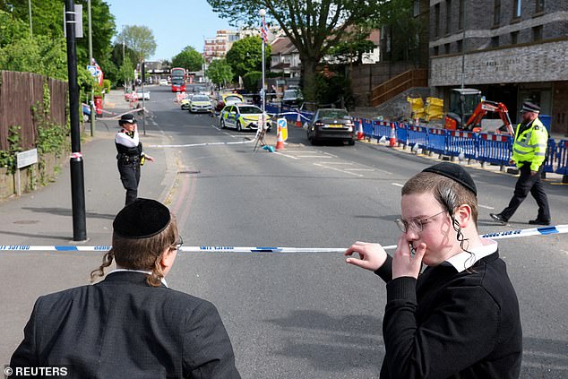 Sir Mark revealed he has urged the Prime Minister to release urgent funding to recruit 300 officers to help protect the Jewish community, including plans for a dedicated policing unit to patrol north-west London