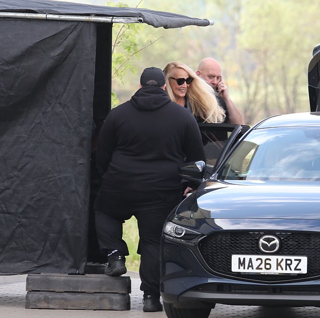 The production crew appeared to ramp up security for Jerry's arrival as she was flanked by bodyguards when getting out of a car before disappearing into a black tent