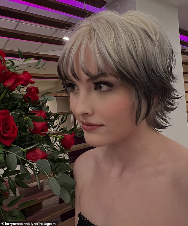 Her blonde locks were trimmed into a shorter pixie cut with the ends dyed a darker hue