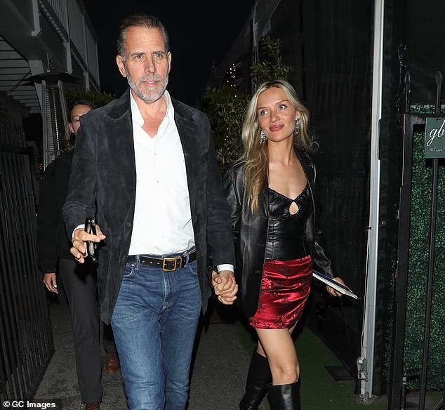 Hunter, seen with his wife Melissa Cohen in May, previously said in court filings that he had no obligation to ever meet his estranged daughter Navy because he never agreed to do so