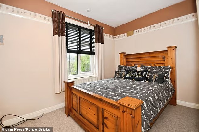 On the first floor are three generously sized bedrooms, along with a family bathroom and a separate toilet