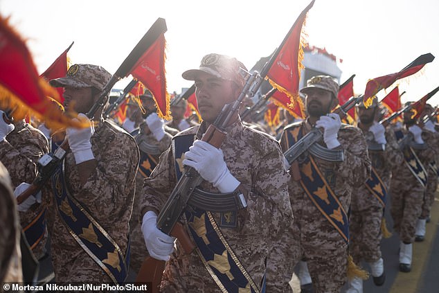 Iran's Islamic Revolutionary Guard Corps take part in a march in September 2024
