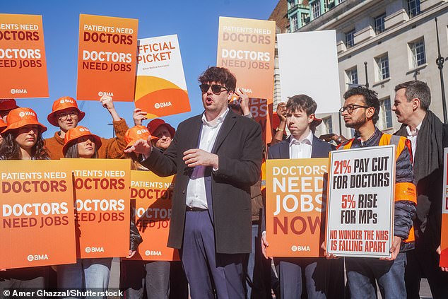 Dr Jack Fletcher, chairman of the BMA resident doctors committee, pictured with resident doctors picketing outside St Thomas Hospital in Westminster at the start of a six day strike over pay on April 7, 2026