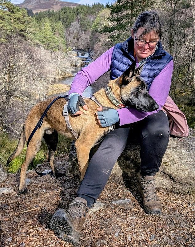 Janet Wilson with her Belgian Malinois-cross rescue dog Dave – she had her insurance denied over a pre-existing condition