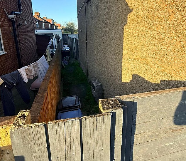 The alleyway, pictured, is said to boast 'good connectivity' to adjoining roads