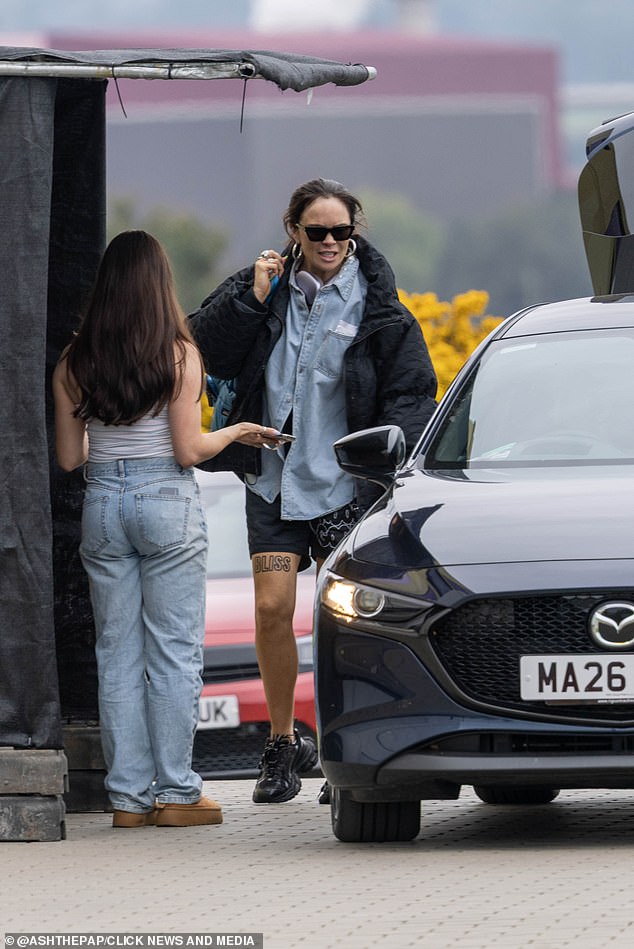 Irish star Joanne dressed for warmed temperatures in her cycling shorts and shades