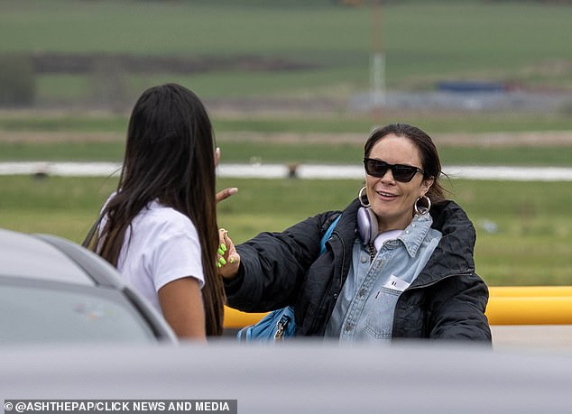 Maya and Joanne were seen sharing a laugh on the tarmac after catching the same flight