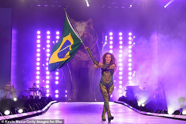 During the show, Shakira reflected on her first time in Brazil: 'I arrived here when I was 18 years old, dreaming about singing for you. And now look at this. Life is magical'