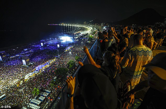 The huge crowd lined the beach to see the singer performer
