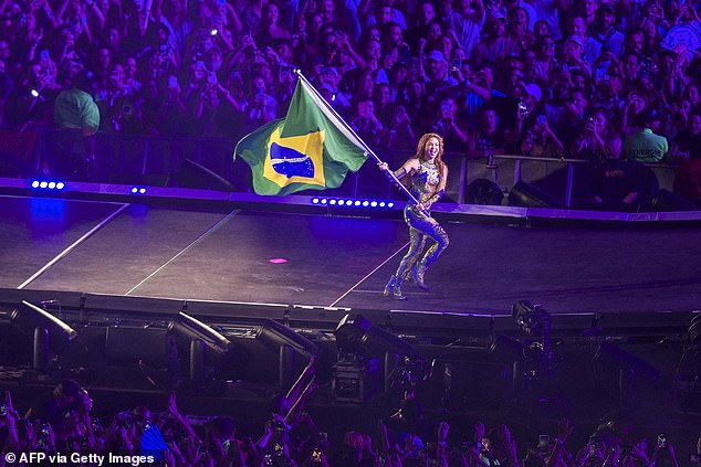 The pop star was also spotted waving a Brazilian flag as she walked the length of the stage before concluding with a huge fireworks display