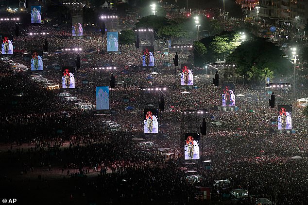 Screens were placed up the beach so two millions concert-goers could watch the star