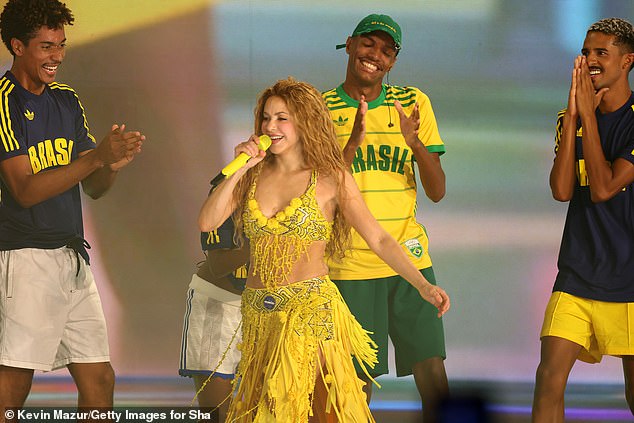 The star later rocked a yellow bralette and skirt