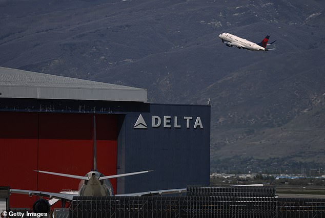 The incident took place on Delta flight 1323. The captain ordered everyone off the plane after Harris allegedly refused to deboard. A Delta flight is pictured taking off (stock image)