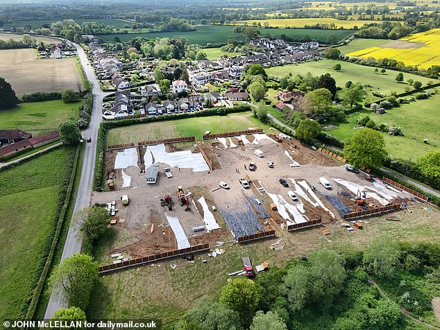 Vegetation was ripped up to prepare the ground for a hardcore and tarmac base. Today, aerial photos showed fences already installed as diggers continued to lay rubble