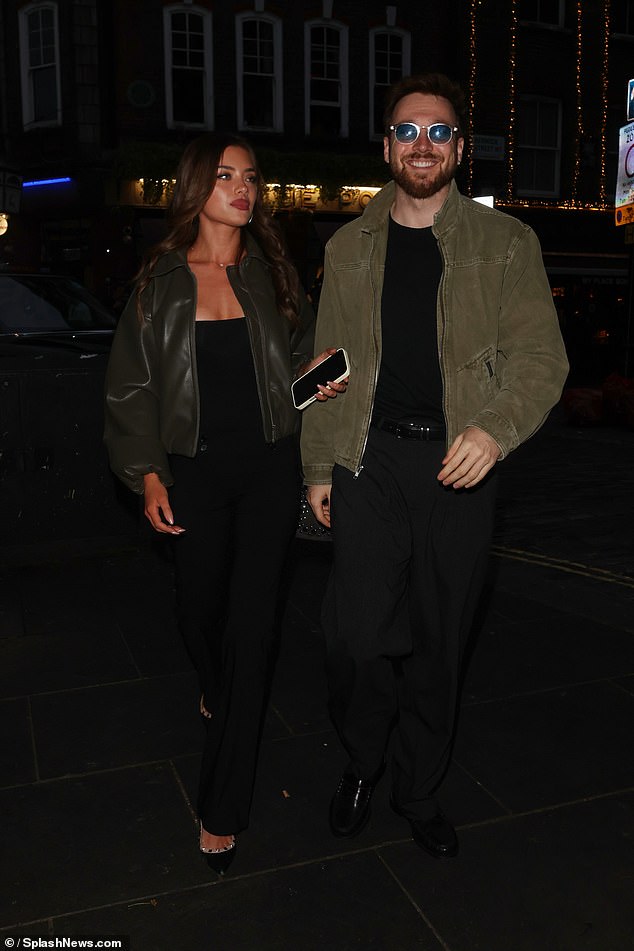 She looked great in a black outfit and leather jacket