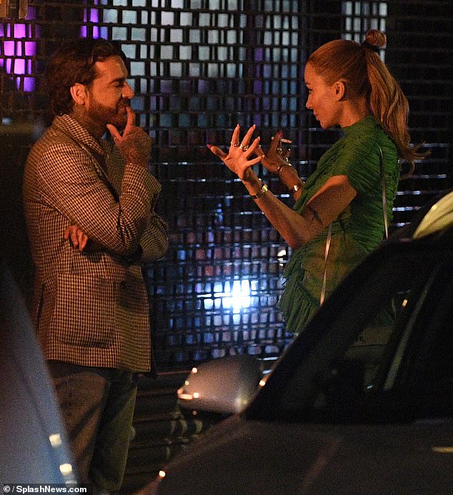 They chatted outside the club