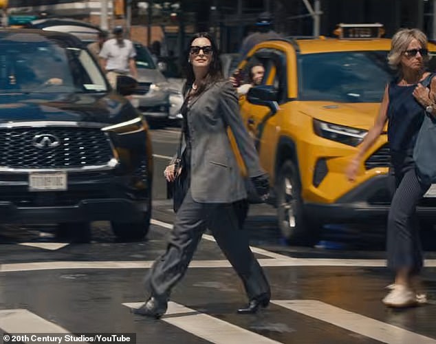 She is then seen pounding the pavements of New York City, just like the first film, although her wardrobe has had an upgrade since the first time fans laid eyes on her