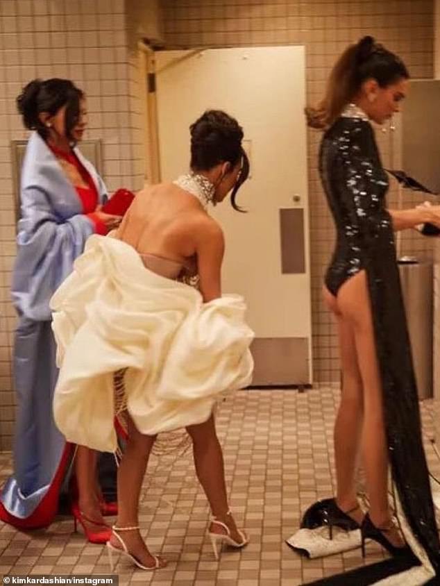 There are famously no photos allowed to be taken inside the gala but Kim shared a sneaky snap with sisters Kendall and Kylie candidly in the bathroom