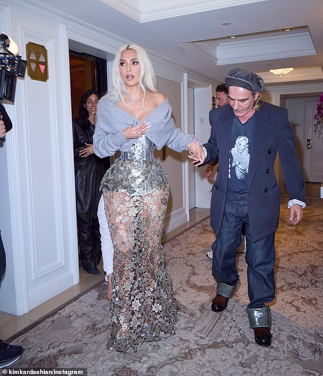 In 2024, Kim sparked a shock reaction for her astonishingly tiny waist in a silver corset as she donned a custom Maison Margiela by John Galliano