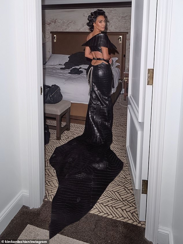 Kim's form-fitting cowgirl chic look also put her pert derriere on display and the star paired the look with a matching low-slung hat
