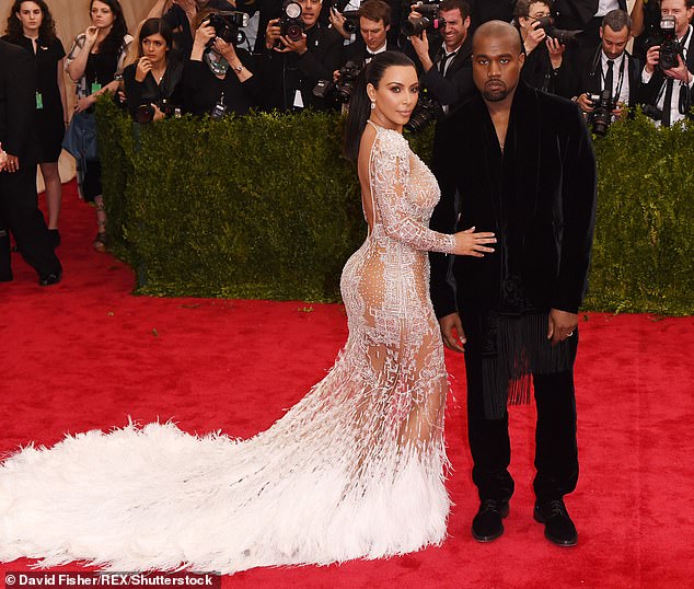 The TV personality seemed to skip out her very sheer and sexy lace gown by Roberto Cavalli in 2015 where she posed with then husband Kanye
