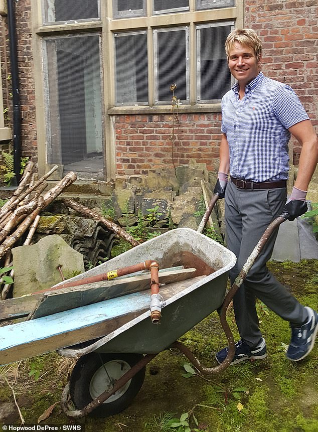 Mr DePree pictured with a wheelbarrow during early restoration work in 2017