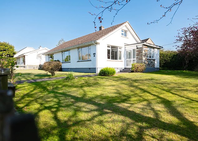 This three-bed bungalow in Trelyn with a wrap-around garden is on sale for £745,000