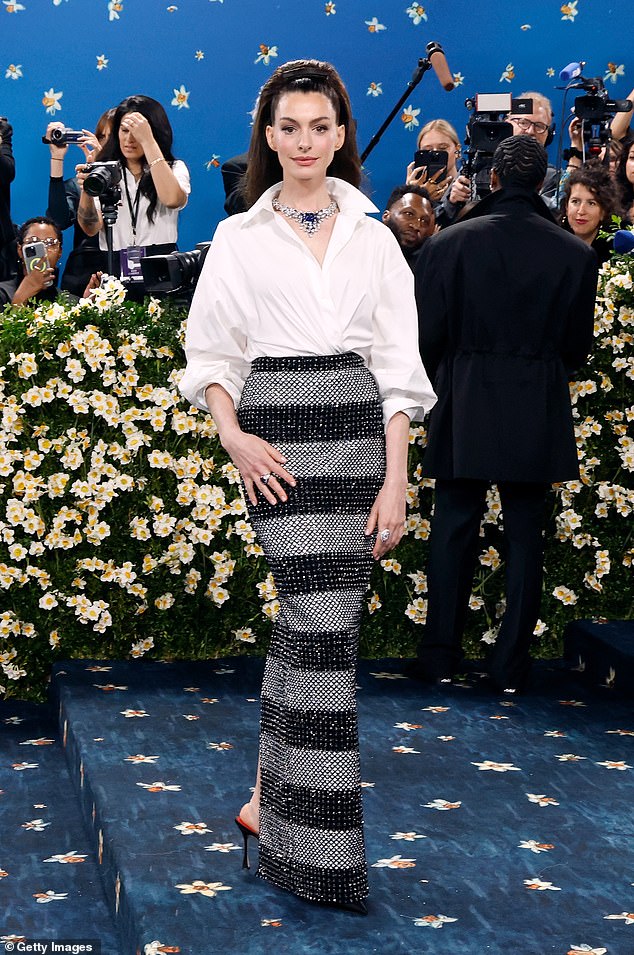 With The Devil Wears Prada 2 debuting days before the Met Gala, Anne Hathaway could also be poised for a return, having last attended in 2025 in a striking Carolina Herrera look - pictured