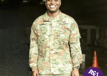 Rashan Legard posing in his military uniform.