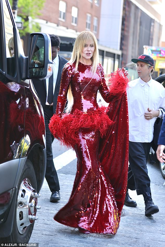 Met Gala 2026 co-chair Nicole Kidman exuded showgirl glamor as she headed to the event on Monday
