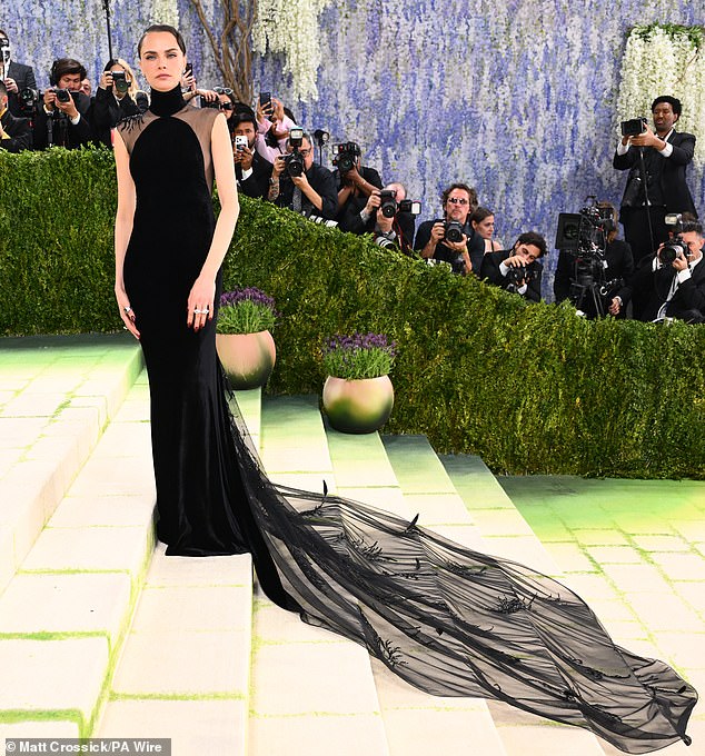 The gown boasted an intricately beaded back and dramatic train