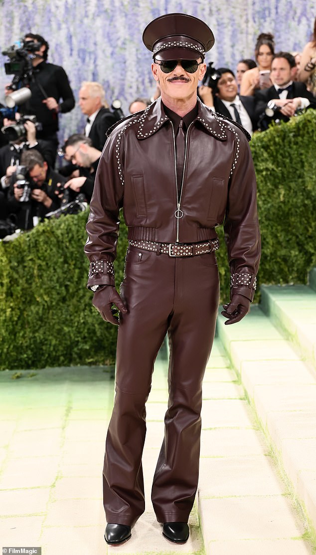 Welsh actor Luke Evans, 47, was clad head to toe in burgundy leather as he hit the red carpet