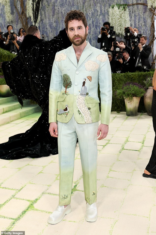 Looks like he traveled back in time! Ben Platt wore a suit that was reminiscent of a children's outfit, as he sported an blue-and-green ombre suit adorned with clouds, trees, and a woman holding an umbrella. He paired the look with chunky, white satin loafers, as his pants appeared to be a bit too short