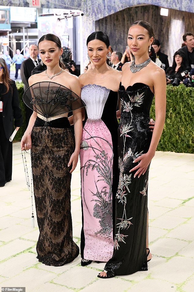 Joined by Wendi - Rupert's third wife - on the red carpet, the billionaire heiresses stunned in coordinating, oriental-inspired gowns by Ashi Studio