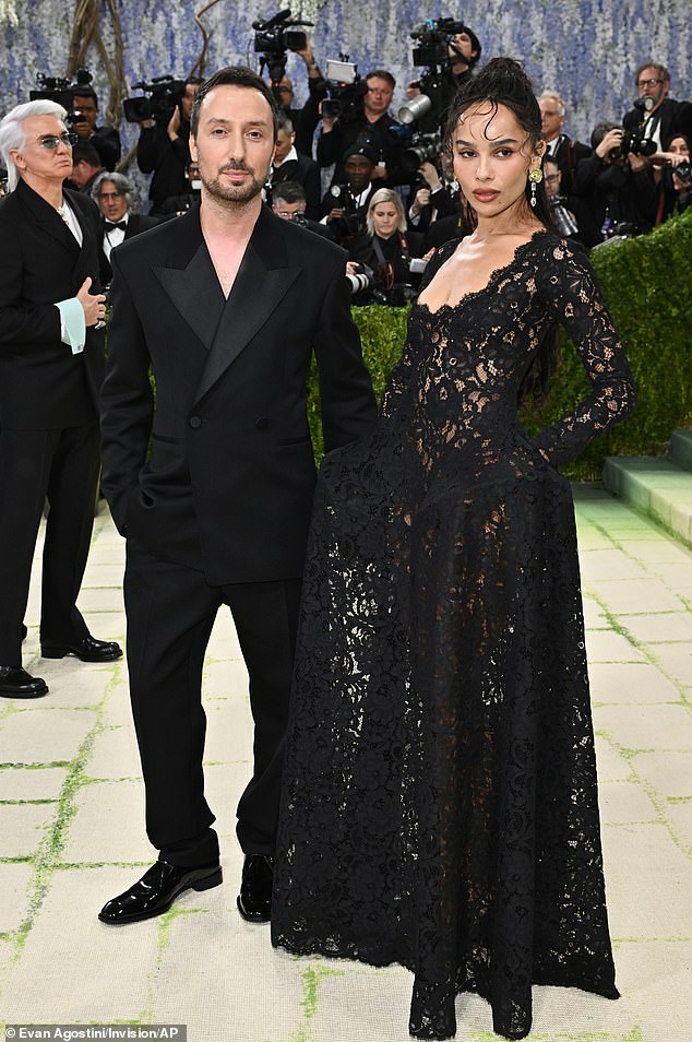 While there was no sign of her fiancé, she did pose on the red carpet with Yves Saint Laurent creative director Anthony Vaccarello